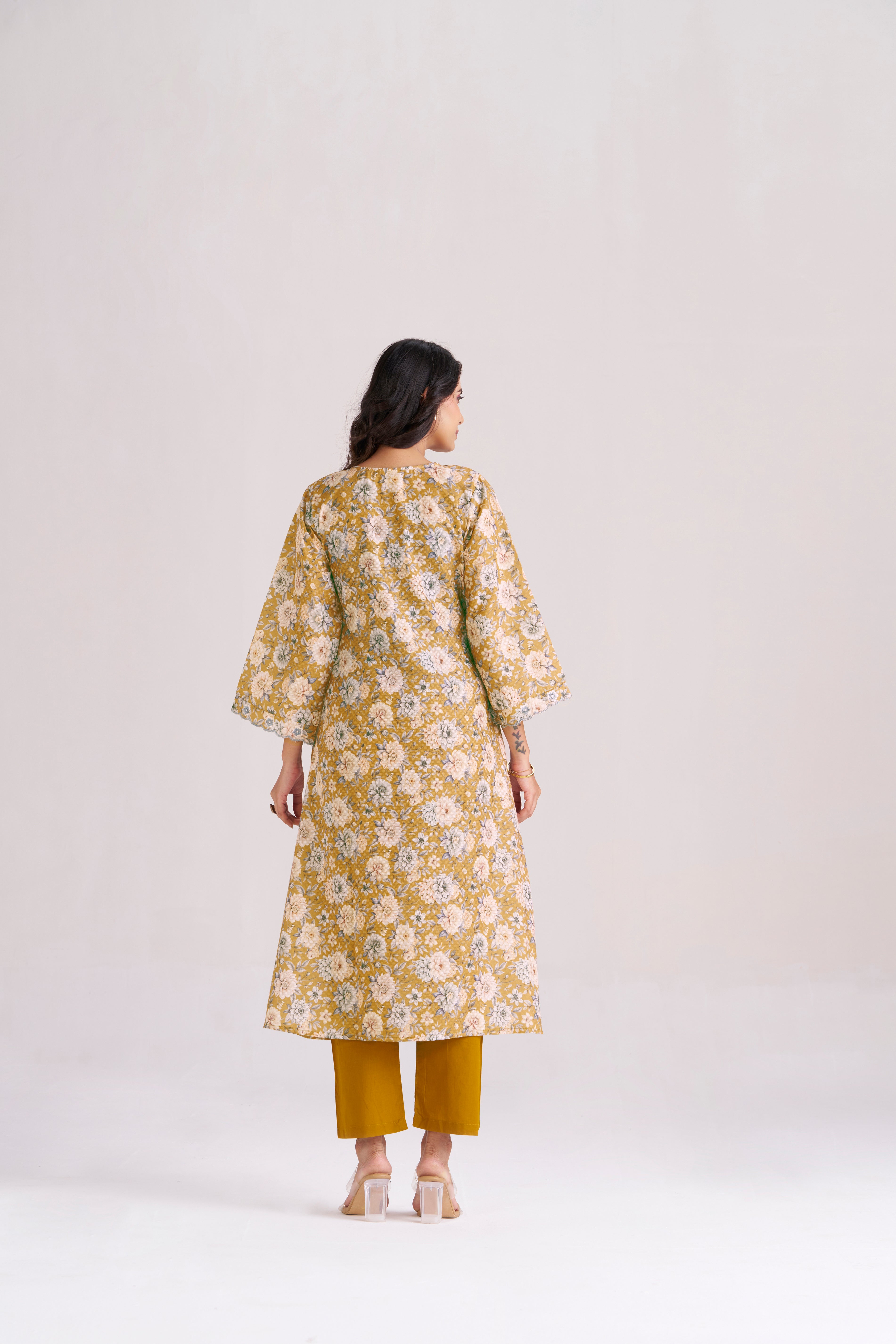 FLORAL PRINT WITH DOBBY WEAVE IN YELLOW