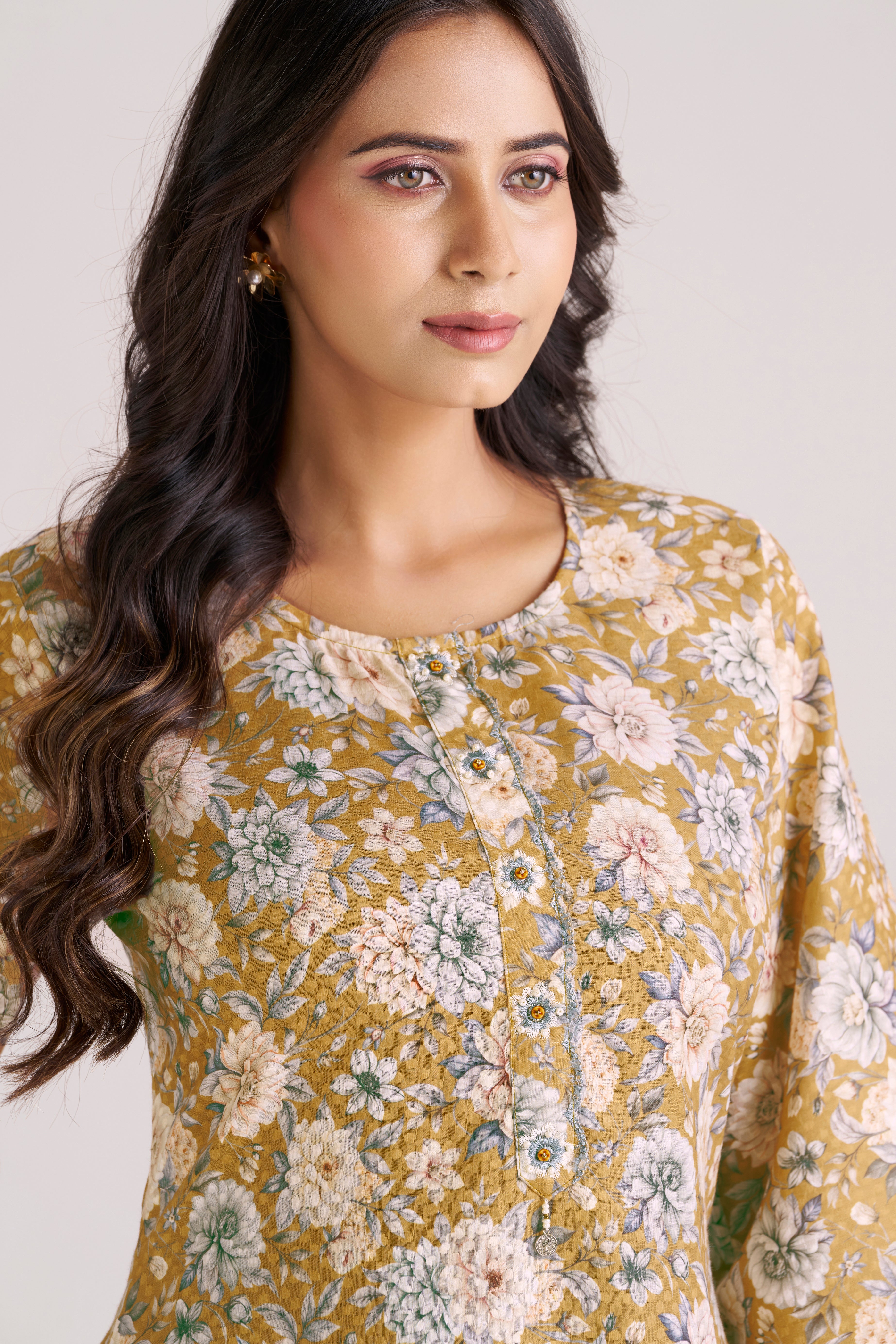 FLORAL PRINT WITH DOBBY WEAVE IN YELLOW