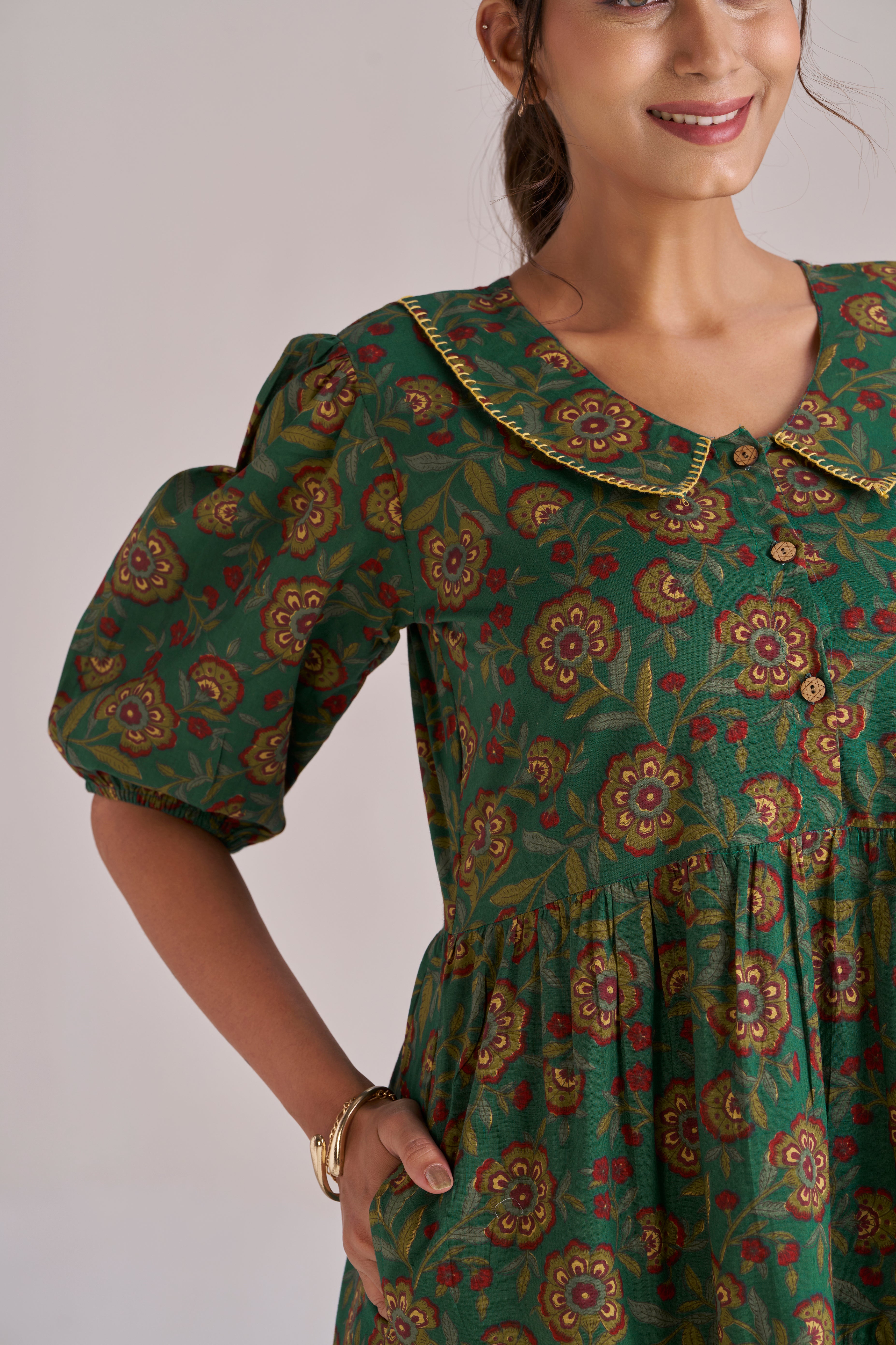 Peter pan collared puff sleeved tiered midi dress in dark green