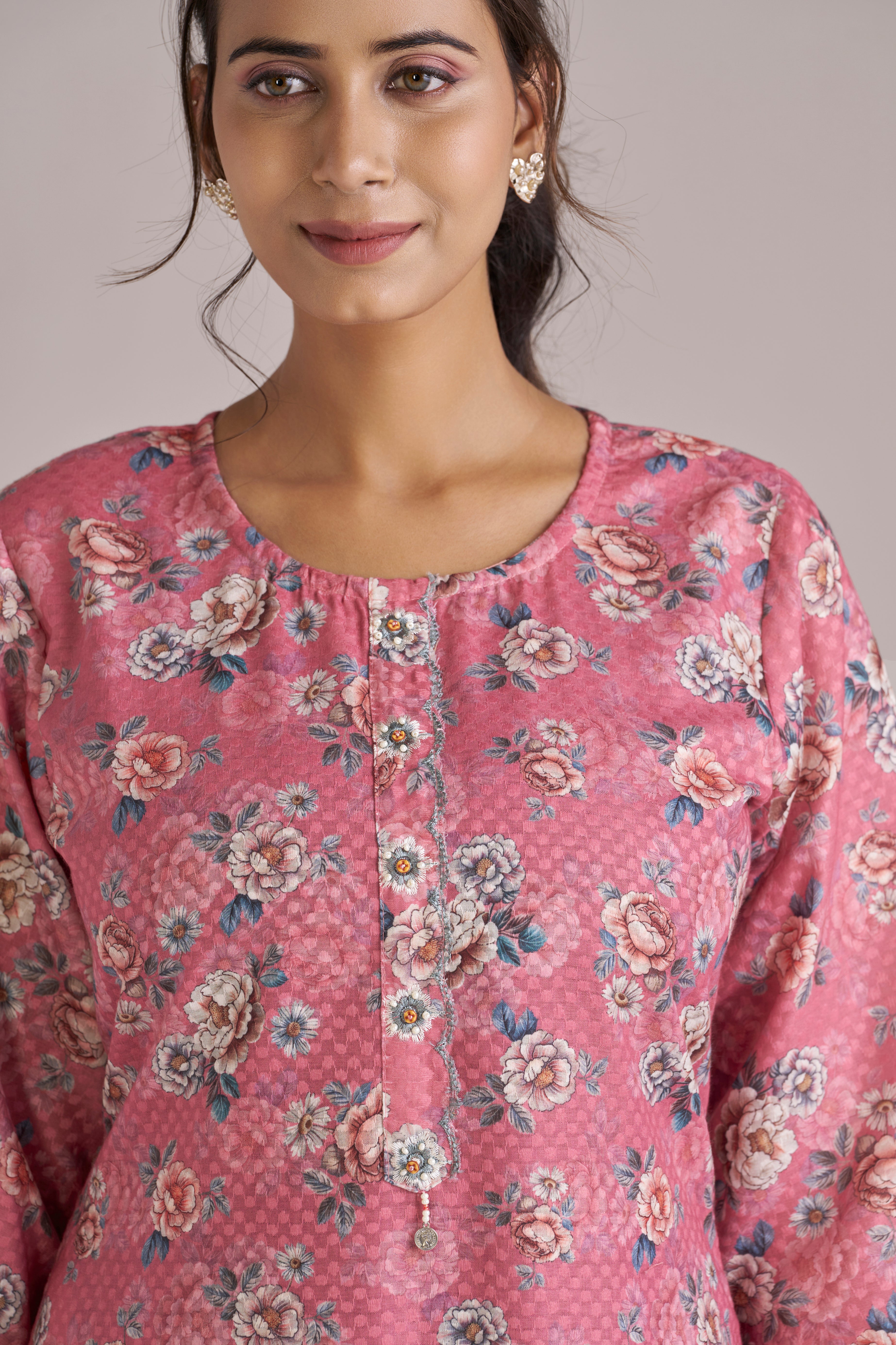 FLORAL PRINT WITH DOBBY WEAVE IN PINK